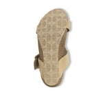 Ronda T-strap slide sandal with an adjustable buckle instep strap, suede covered footbed, and cork/latex combination in tan croc nubuck-bottom view