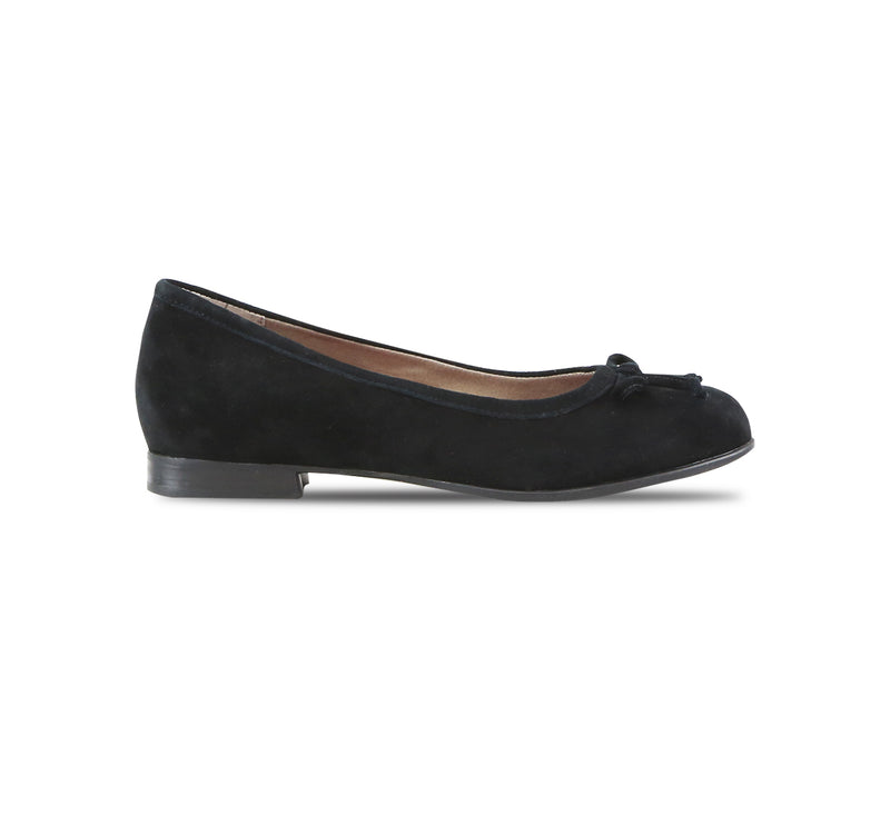 Joslynn kid suede in black flatt with a dainty bow and half-inch wedge for comfort - side view