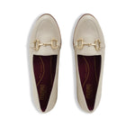 Tanya loafer in cream lamb leather with saddle bit, apron vamp, and latex rubber outsole-top view