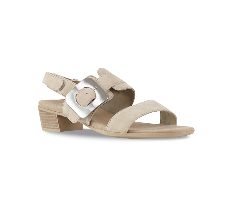 Ashlin mid-heel beige suede dress sandal with wide band vamp strap and hook & loop ankle strap and large decorative buckle-angle view