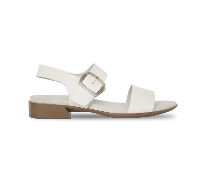 Cleo dress or casual sandal on low heel with buckle on ankle strap in off-white leather-side view