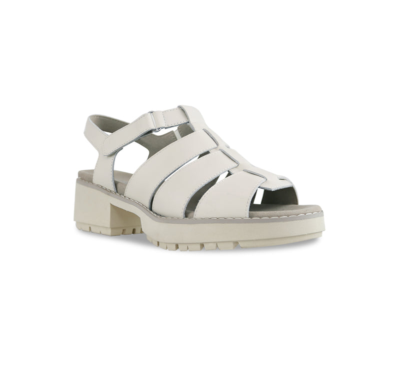 Marley three-strap and T-strap fisherman sandal with hook and loop ankle strap on lug outsole unit in latte leather-angle view