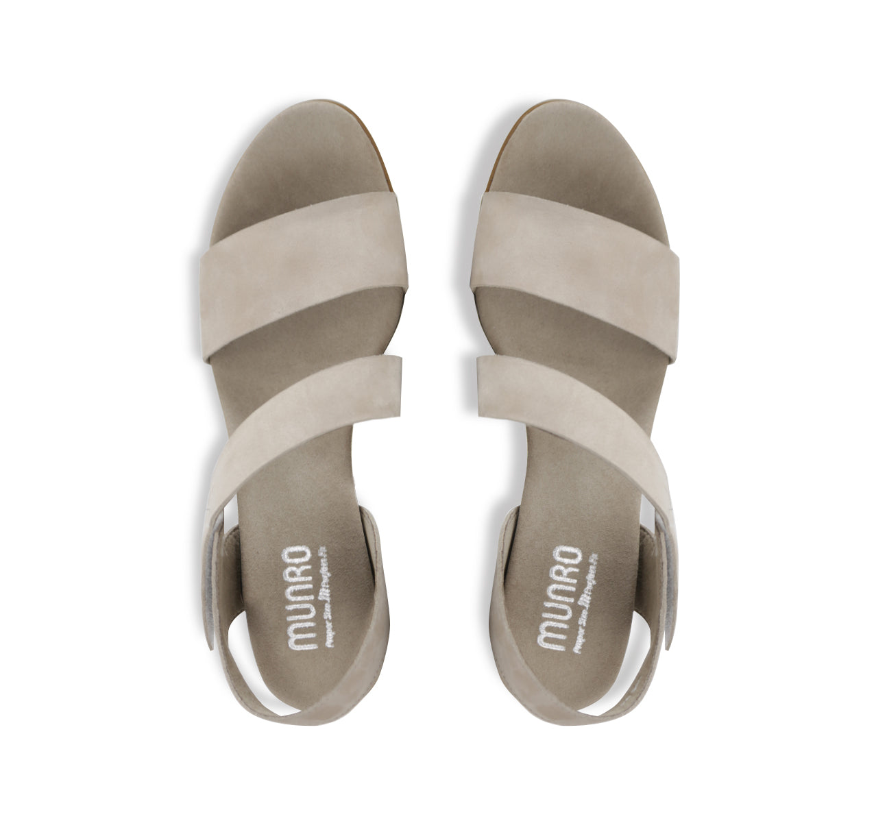 Lucia dress sandal with a single-band vamp strap and an asymmetrical hook & loop instep strap in stone leather-top view