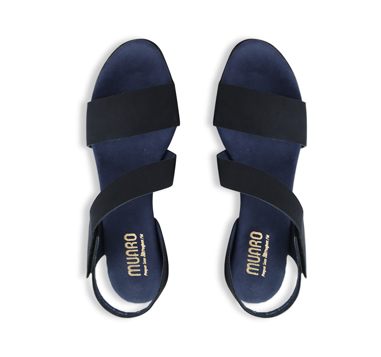 Lucia dress sandal with a single-band vamp strap and an asymmetrical hook & loop instep strap in navy leather-top view