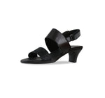 Livia double strap dress sandal in black leather and black printed suede with a hook & loop back strap-inside view