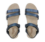 Juniper strappy suede covered cork footbed sandal on platform wedge in blue metallic leather-top view